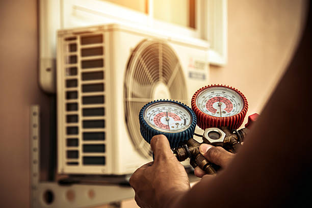 Professional Air Conditioning Service technician working in Lagrangeville, NY